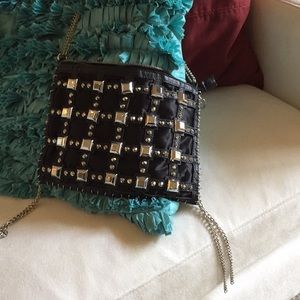 Studded black hand bag
